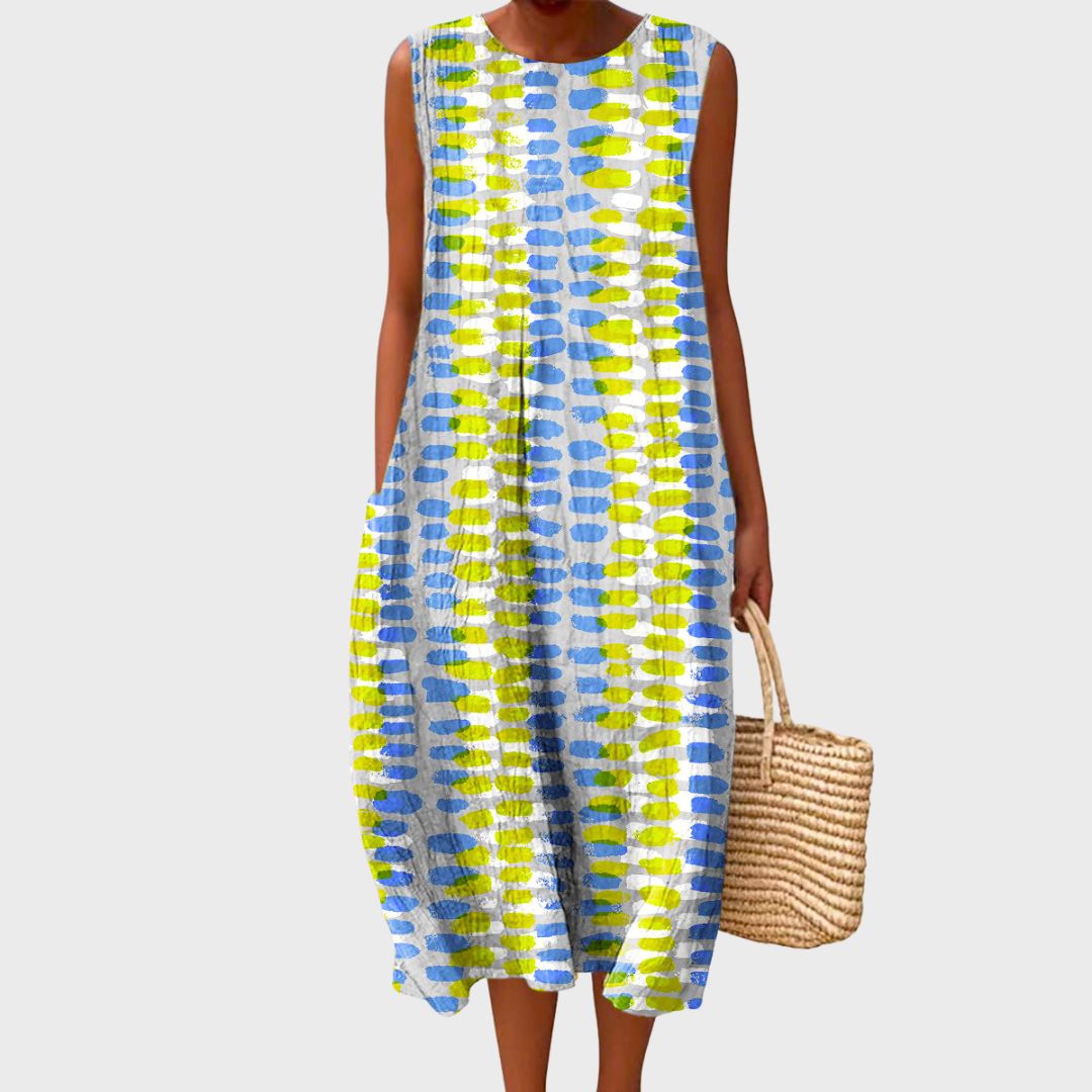 Sleeveless batik-style midi dress in blue and lime green with white