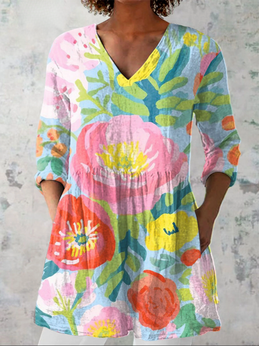 Multicolor long V-neck blouse with loose fit and colorful floral print, three-quarter sleeves