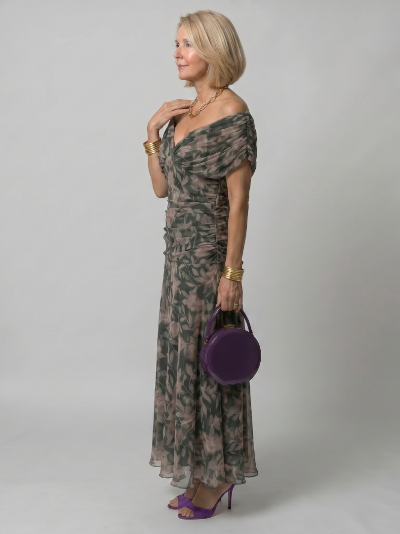 Dark green floral off-shoulder flow midi dress, side view, gathered waist and skirt