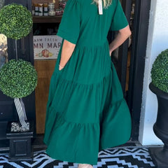 Green tiered maxi dress with short sleeves and V-neck