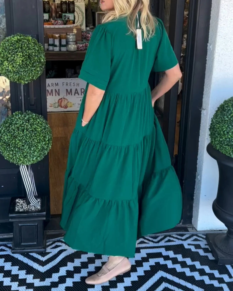 Green tiered maxi dress with short sleeves and V-neck