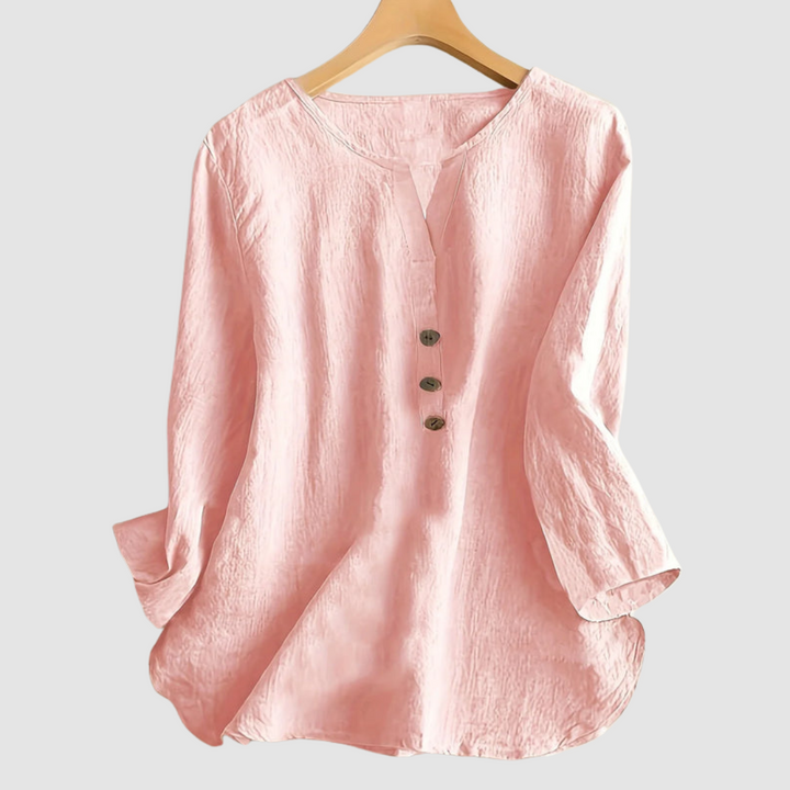 Pink cotton-linen blouse, round neckline with three-button placket and three-quarter sleeves