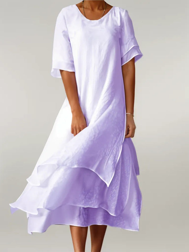 Purple cotton long dress with short sleeves, round neck, and layered ruffle hem