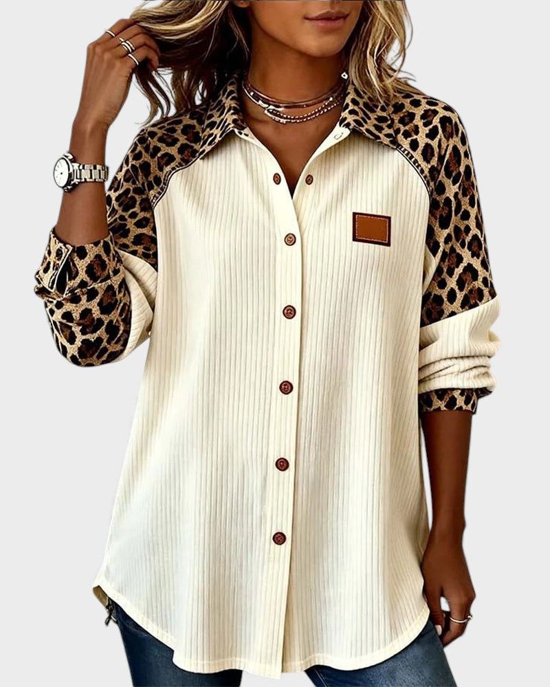 Off-white pinstripe button-down shirt with leopard print sleeves, chest patch pocket