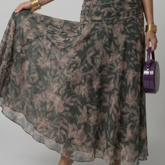 Dark green floral off-shoulder flow midi dress, close-up of flowing chiffon skirt
