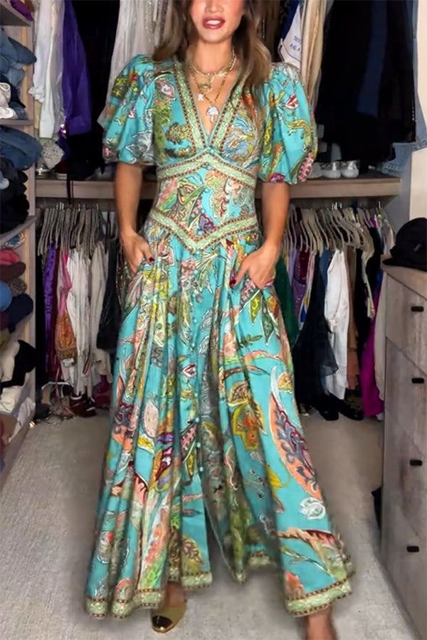 Airy maxi dress with puff sleeves, V-neck, teal floral print and gathered waist