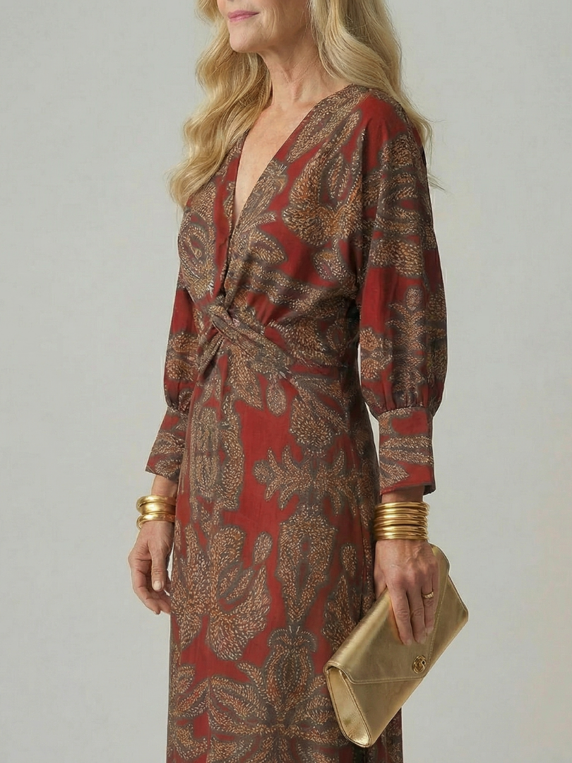 Wrap midi dress with long puff sleeves in red and gold leafy print