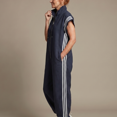 Navy blue stripe jumpsuit with short sleeves, front zipper and white side stripes