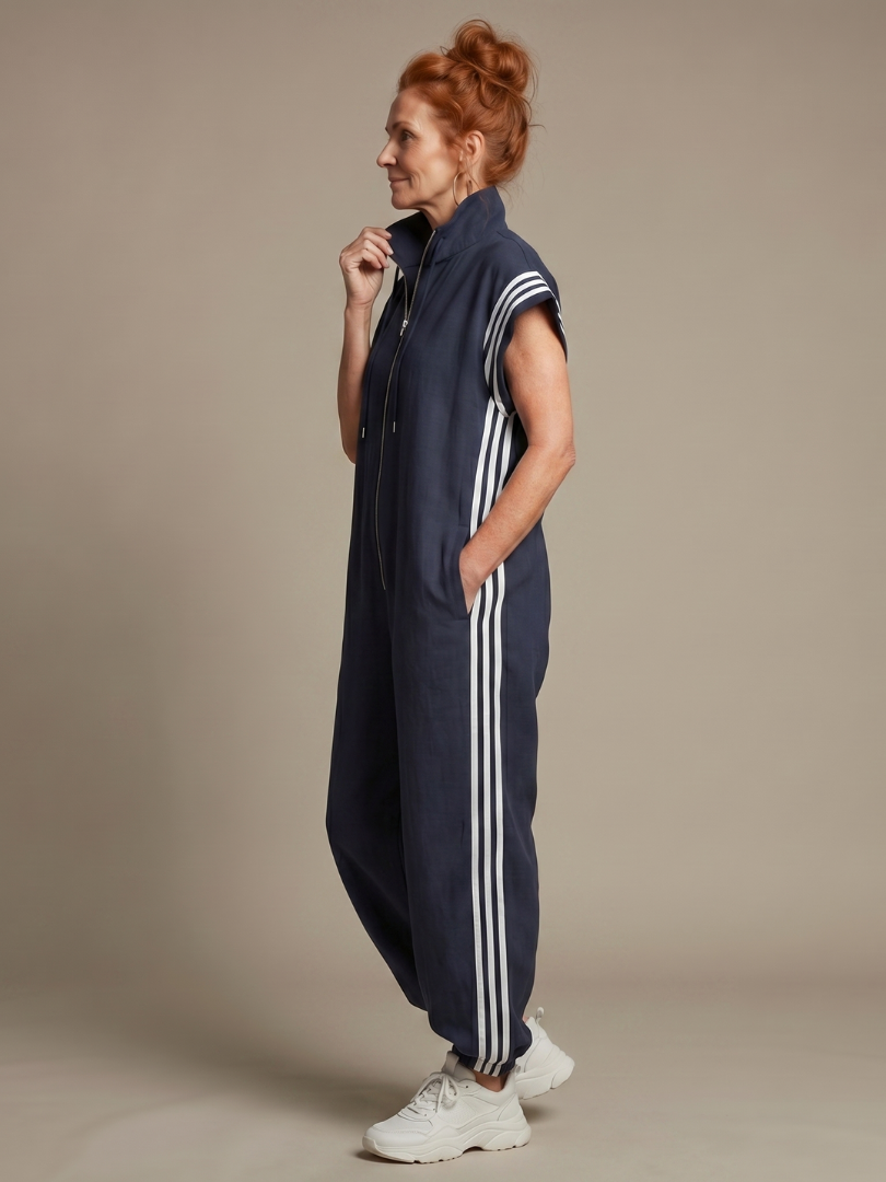 Navy blue stripe jumpsuit with short sleeves, front zipper and white side stripes