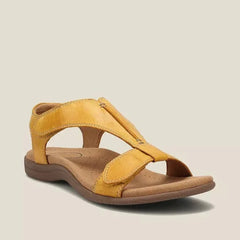 Yellow orthopedic sandals with wide cross-strap and low cushioned sole