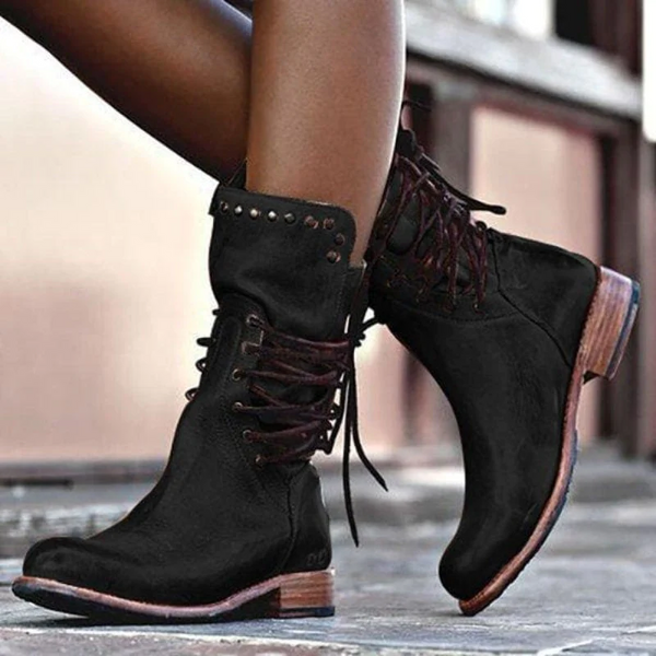 Vintage lace-up boots in black leather with studded cuff and dark red-brown heel