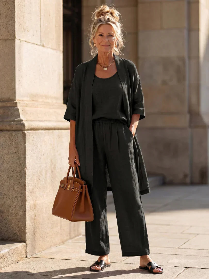 Black women's elegant set: draped short-sleeve cardigan over matching wide-leg pants