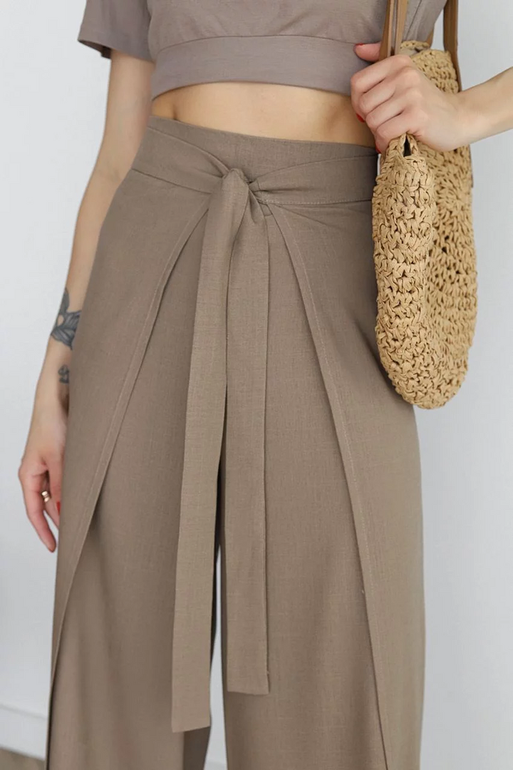 Women’s wide-leg trousers in taupe with front tie waist and pleated drape detail