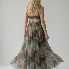 Back view of multicolor soft wrap maxi dress with V-back straps and gathered waist, flowing skirt.