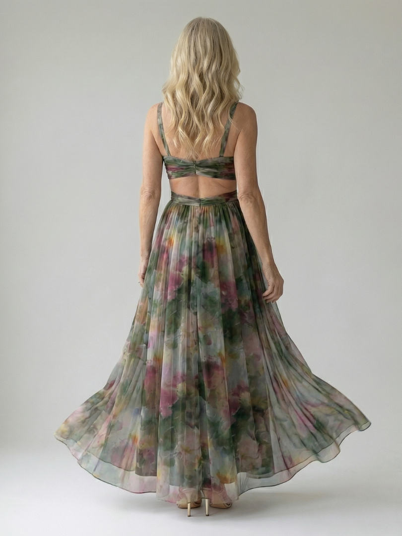 Back view of multicolor soft wrap maxi dress with V-back straps and gathered waist, flowing skirt.