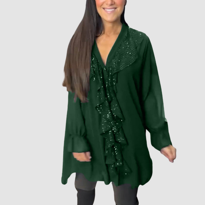 Green ruffled V-neck blouse with glittery front detail and long sleeves.