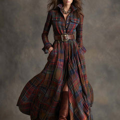 Belted shirt dress in red and green plaid with long sleeves, button-front, and full skirt