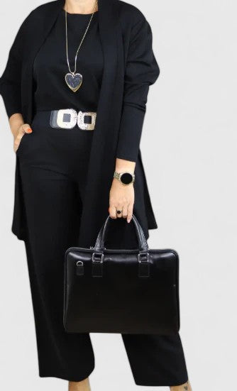 Black three-piece outfit with long blazer, short top, and wide-leg pants