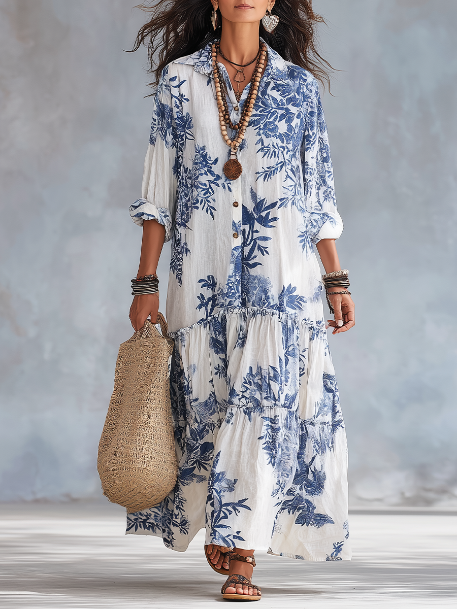 Bohemian tiered maxi dress in white with blue floral print, button-front, 3/4 sleeves