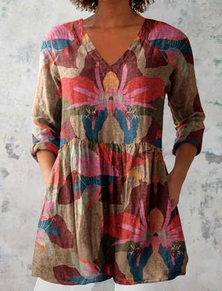 Multicolor floral long-sleeve V-neck blouse with gathered waist flare