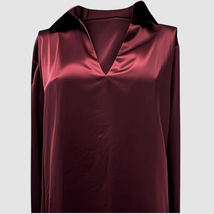 Burgundy satin blouse with deep V-neck and long sleeves