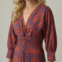Wrap midi dress neckline and sleeves in purple with rust leafy print