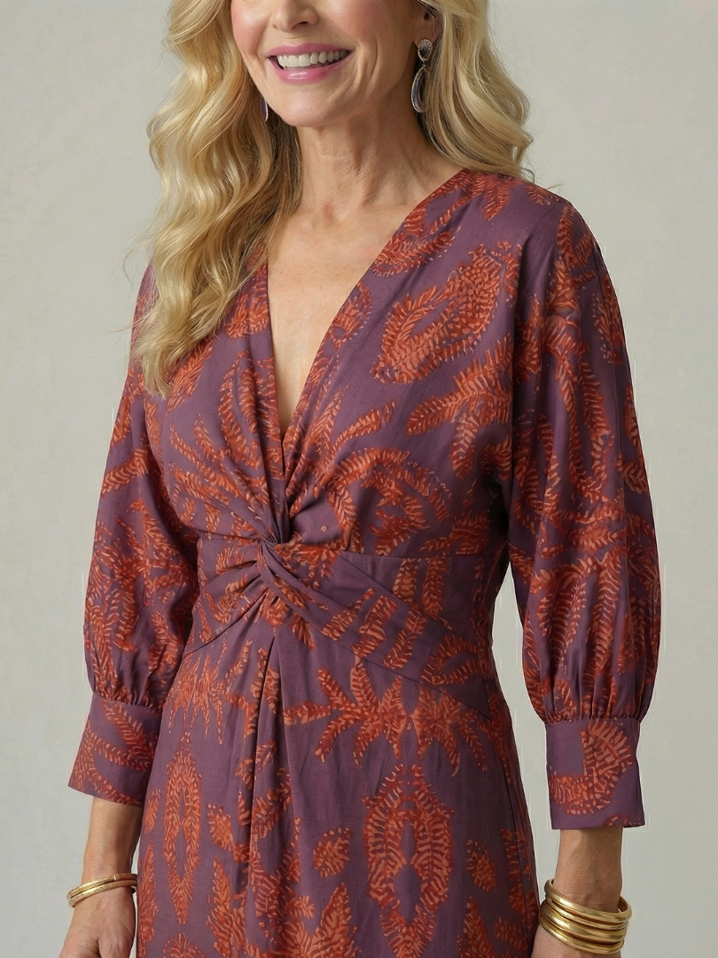 Wrap midi dress neckline and sleeves in purple with rust leafy print