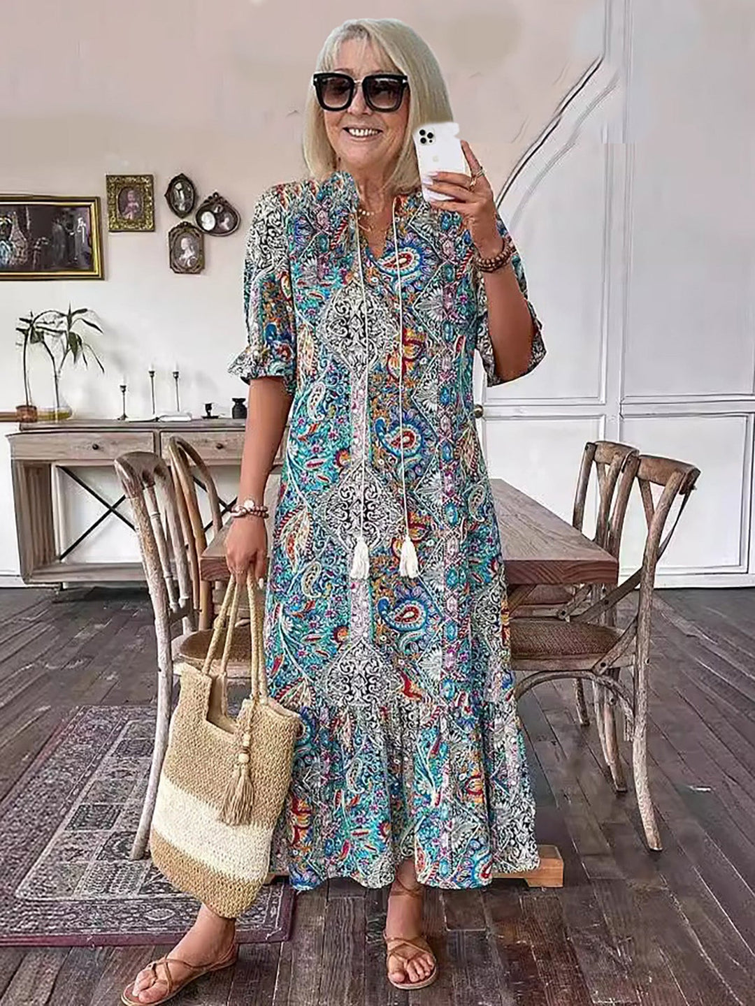Blue paisley Boho Grace dress with short puff sleeves and tassel-tie neckline