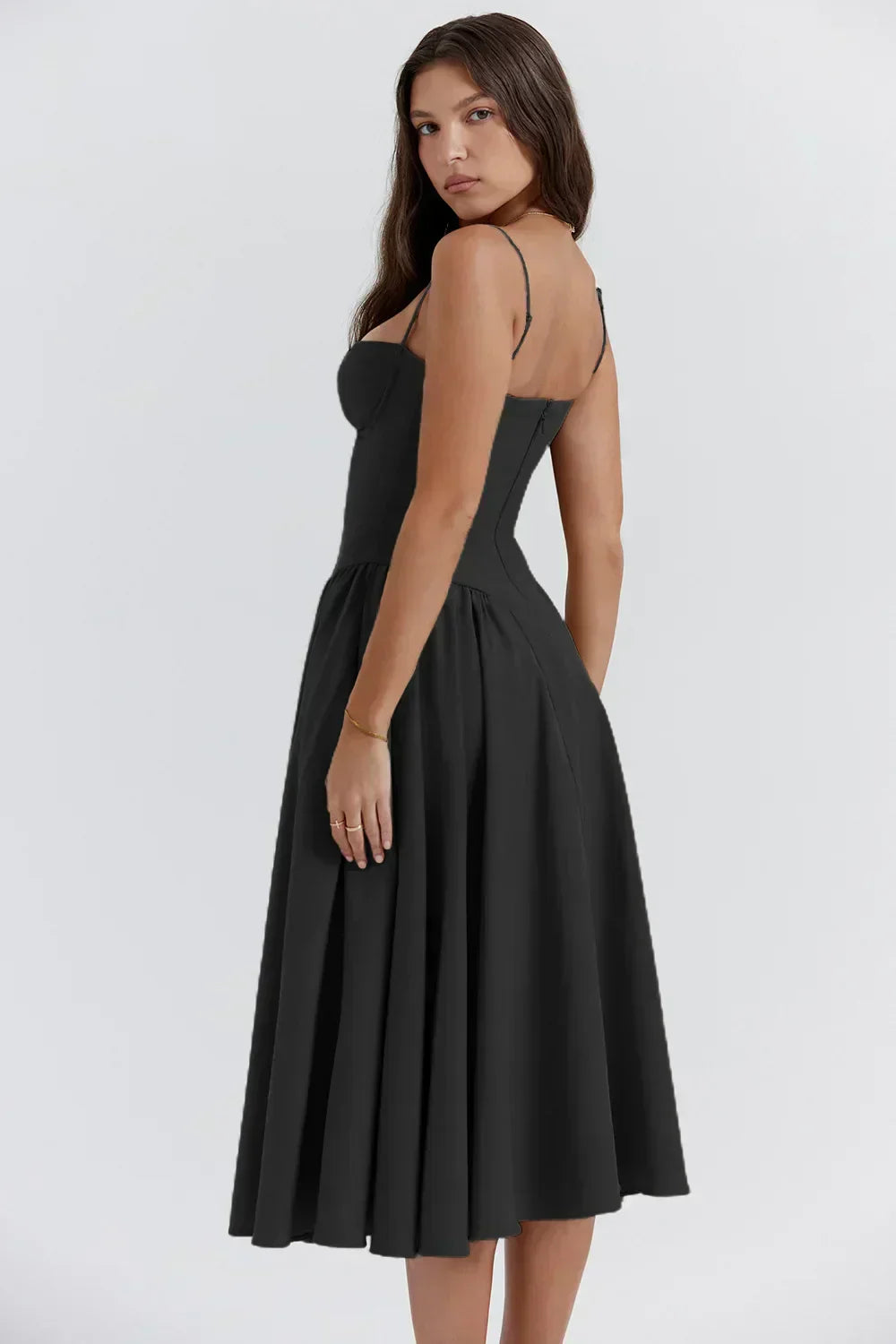Black corset sundress with sweetheart bodice and pleated midi skirt