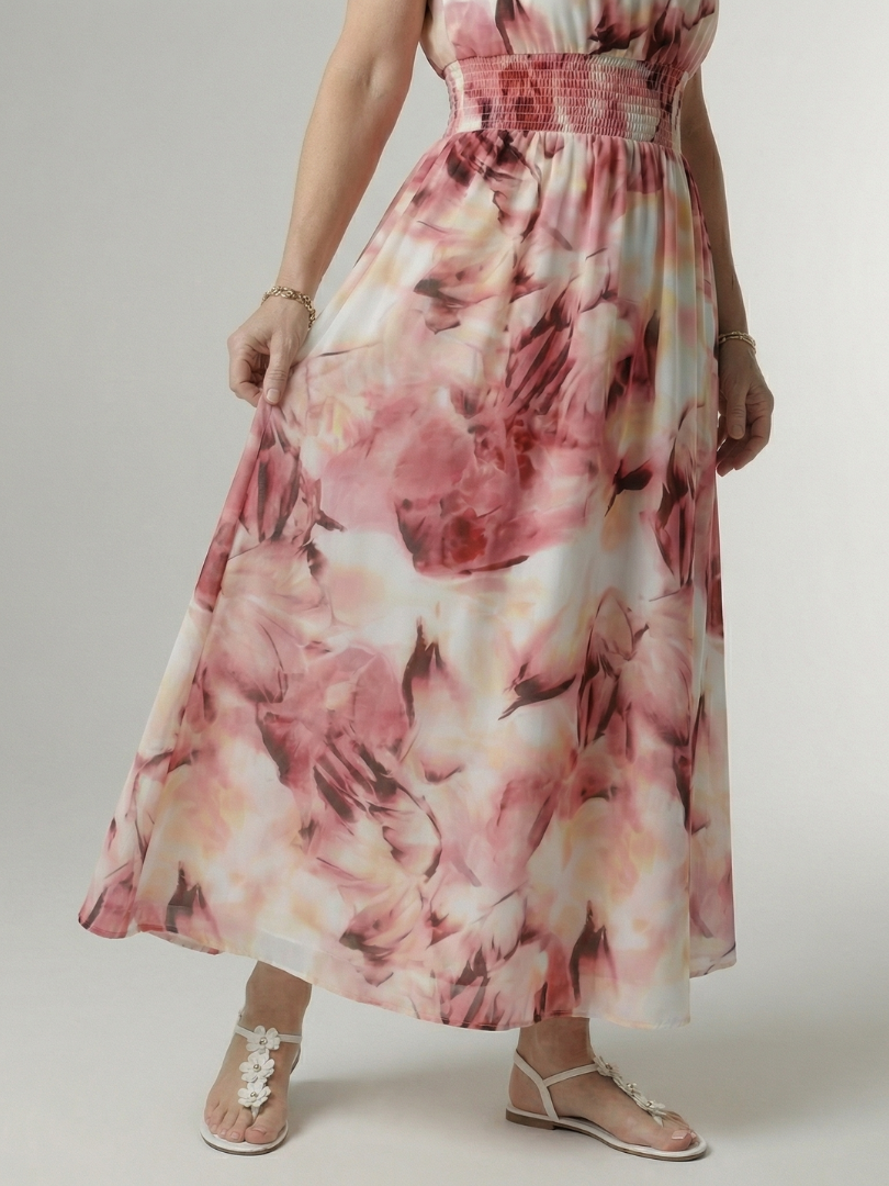 Pink floral gathered halter midi dress, waist gathered and midi-length tiered skirt.