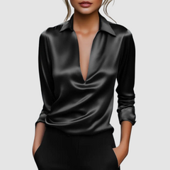 Black satin blouse with collared deep V neckline and 3/4 roll-tab sleeves