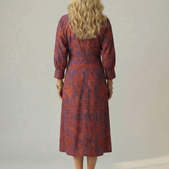 Back view wrap midi dress with three-quarter sleeves in purple and rust print