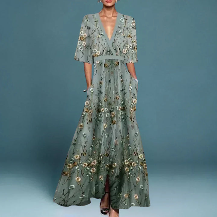 Sage green maxi dress with V-neck and floral print, tiered skirt