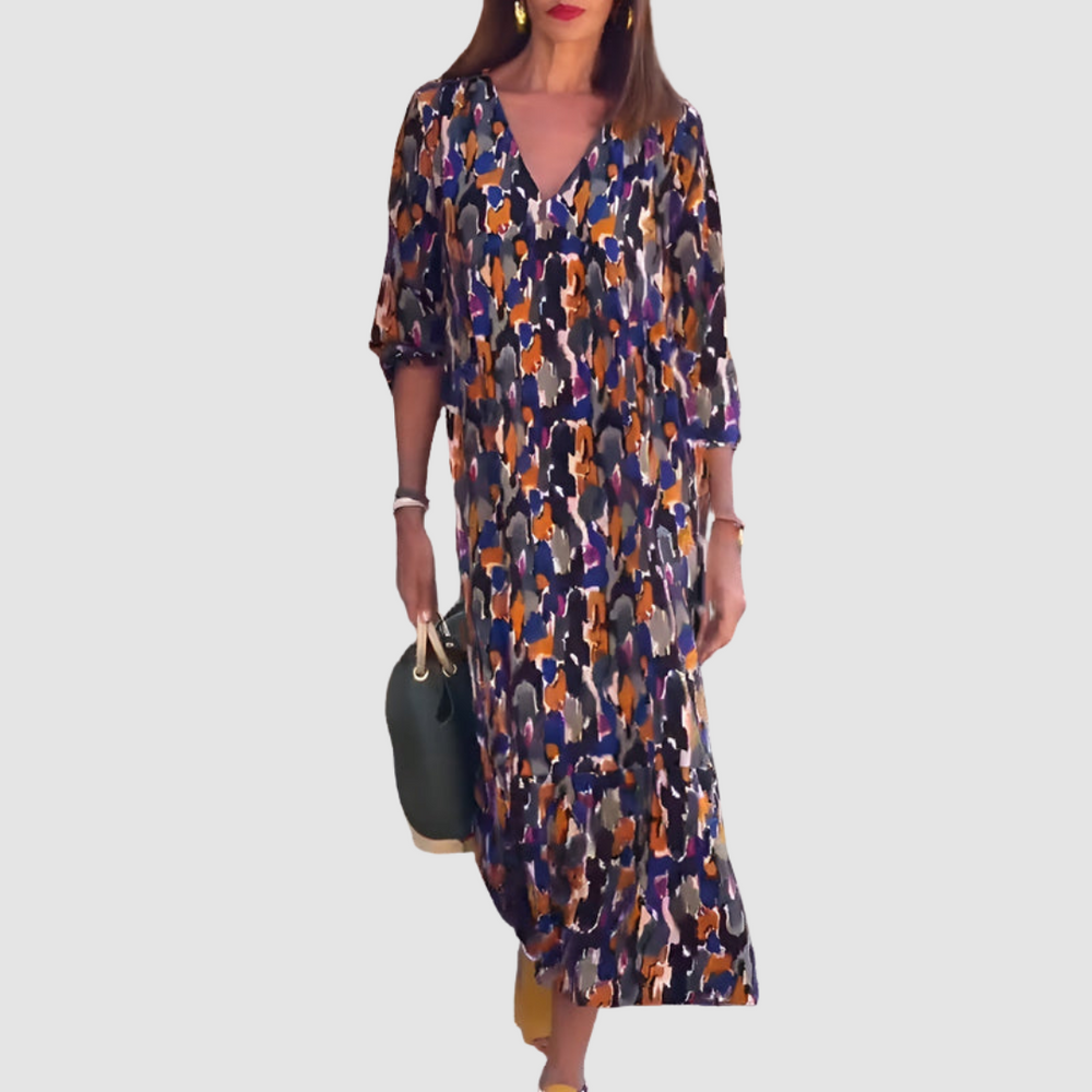 V-neck midi dress, navy base with multicolor abstract pattern, 3/4 puff sleeves