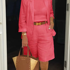 Red two-piece suit set with cropped blazer and matching shorts
