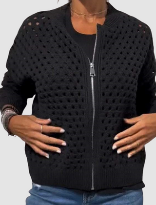 Black knitted cardigan with full-zip front, raised dot grid texture, ribbed hem and cuffs