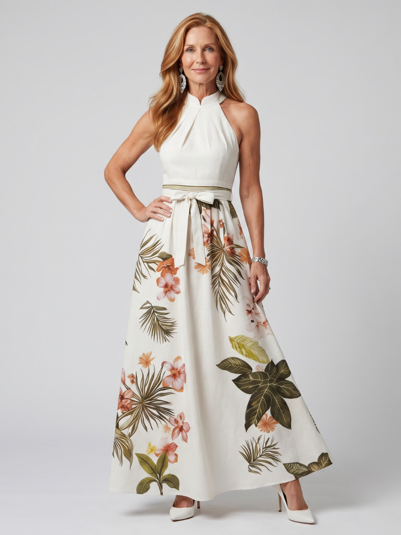 White draped halter botanical maxi dress with gathered waist and flowing skirt