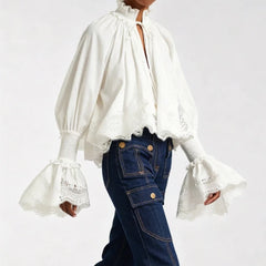 Vivienne blouse in white with high ruffled collar, gathered cuffs, lace panel front