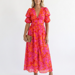 Pink floral V-neck midi dress with puff sleeves and gathered waist