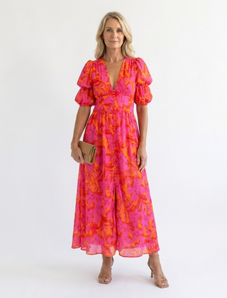 Pink floral V-neck midi dress with puff sleeves and gathered waist