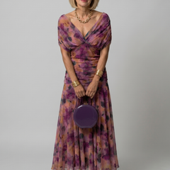 Purple off-shoulder flow midi dress with twist-front bodice and tiered skirt