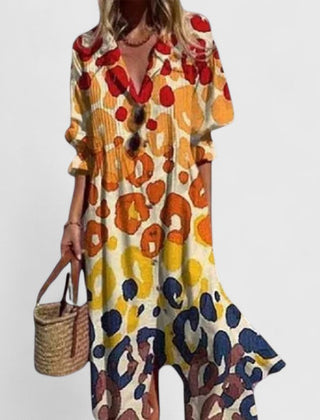 Orange boho dress with abstract polka-dot pattern, V-neck and relaxed elbow sleeves