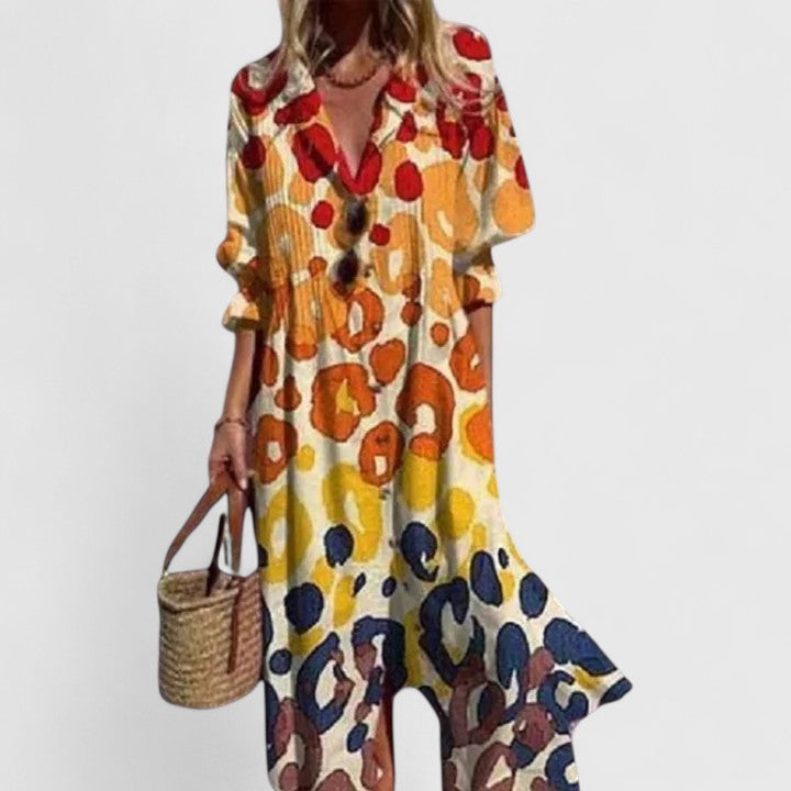 Orange boho dress with abstract polka-dot pattern, V-neck and relaxed elbow sleeves