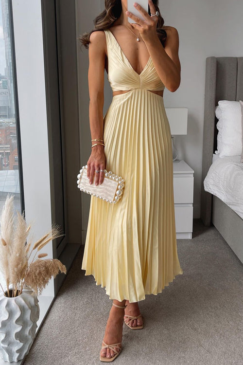 Light yellow sleeveless pleated maxi dress with V-neck and cut-out waist detail