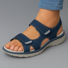 Blue orthopaedic support sandal with adjustable hook-and-loop straps and cushioned sole