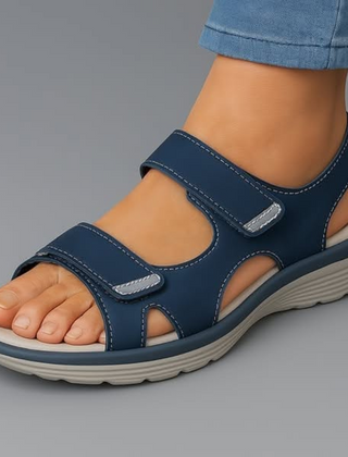Blue orthopaedic support sandal with adjustable hook-and-loop straps and cushioned sole