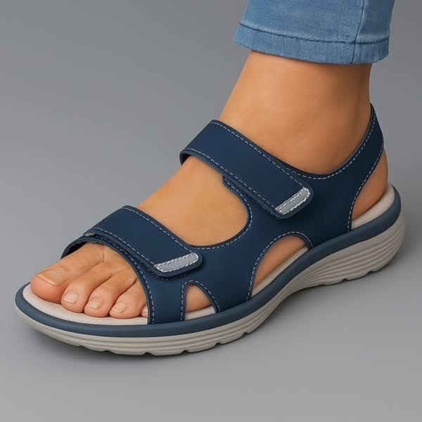 Blue orthopaedic support sandal with adjustable hook-and-loop straps and cushioned sole