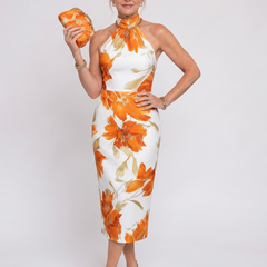 Halter neck floral midi dress in white with orange flower print, sleeveless and fitted