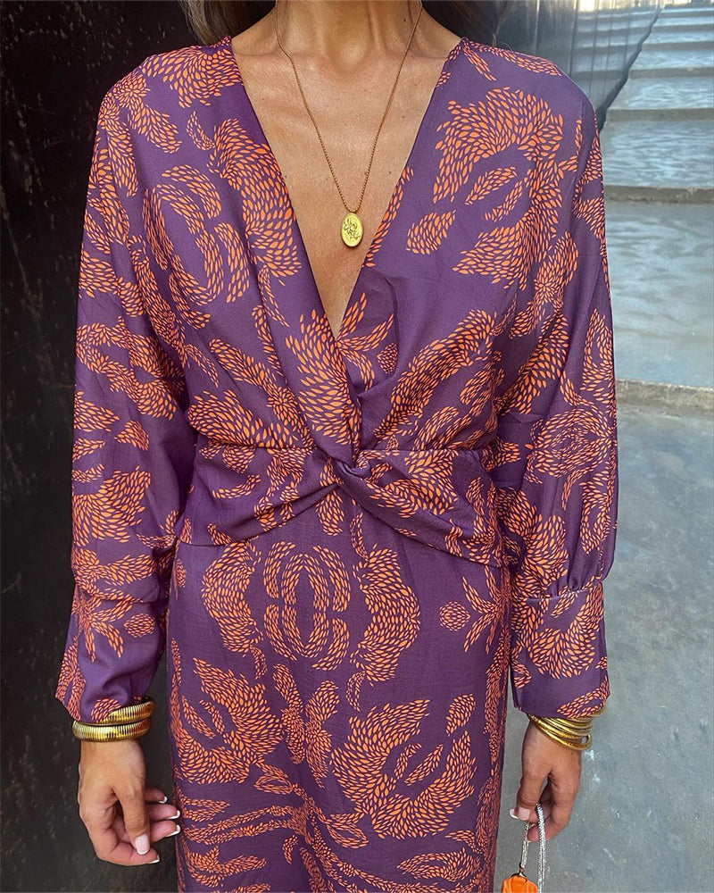 Elegant summer dress in purple with orange leaf print, V-neck tie waist, long sleeves