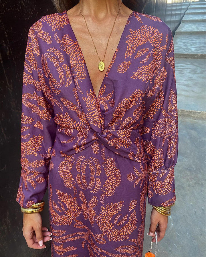 Elegant summer dress in purple with orange leaf print, V-neck tie waist, long sleeves